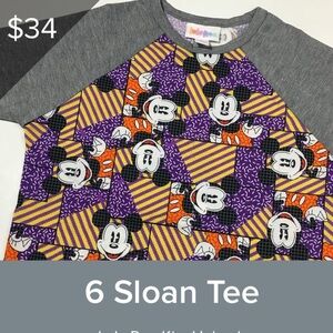 NWT-LuLaRoe Gray and Purple 3/4 Kid’s Sleeve Tee.